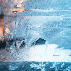 Ice flowers on glass - texture and background
