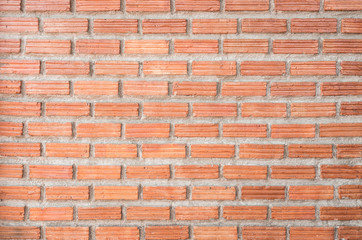Textured of red brick wall background