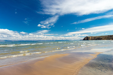 The sandy shore of Lake Baikal