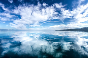 Fototapeta na wymiar Reflection of clouds in the sea
