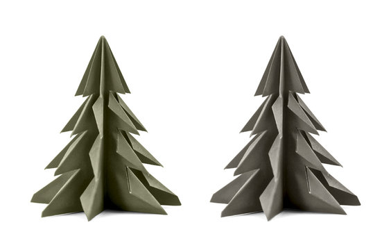 Origami Christmas tree paper isolated on white background. For decoration, Merry Christmas or Happy New Year postcard. grey green and grey color. Front view. Close up.