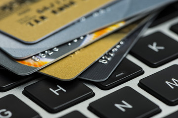 Stack of multicolored credit cards close-up