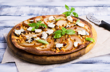 Traditional pizza with pear
