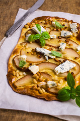 Traditional pizza with pear