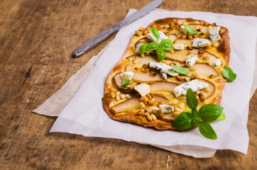 Traditional pizza with pear
