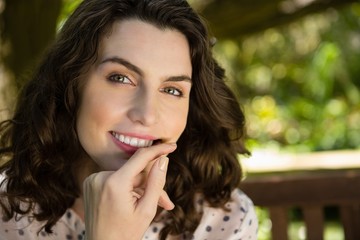 Portrait of smiling woman in garden