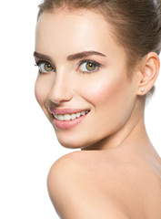Fototapeta premium Beautiful face of smiling woman with clean fresh skin