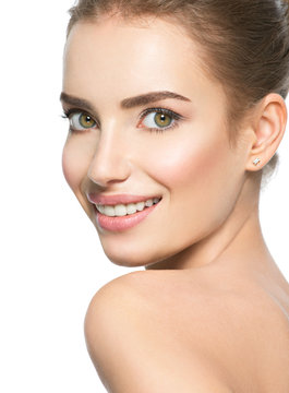 Beautiful face of smiling  woman with clean fresh skin