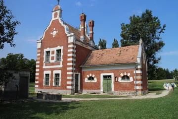 Fototapeta na wymiar Holland house (A Holland Ház) on isle in garden of Classicist manor house in Dég, Hungary