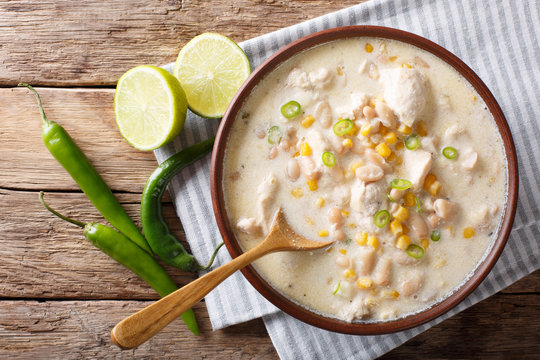 White chili chicken with beans, corn and spices. horizontal top view