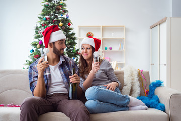 Happy couple celebrating christmas holiday