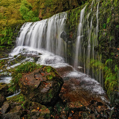 Fototapeta na wymiar Sgwd Isaf Clun Gwyn Waterfall in Brecon Beacons, Wales