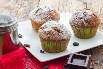 Muffins on a wooden table