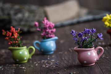 Artificial Little Yellow, Purple and Red Flowers in Little Flowerpots