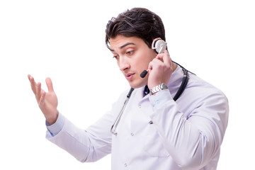 Young doctor with phone headset isolated on white