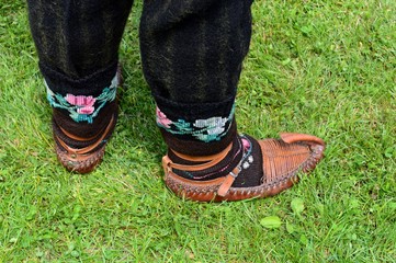 shoes and embroidered socks are traditional