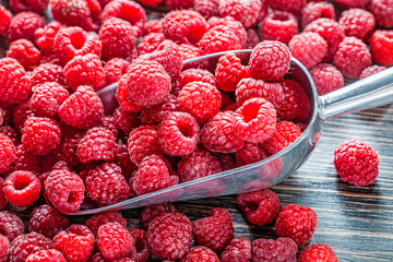 Raspberry scoop healthy food concept