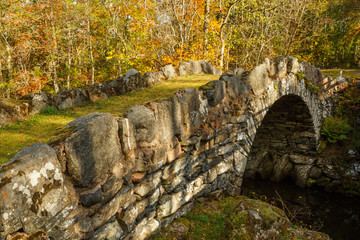 Old stone bridge crossing a river