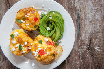 Delicious egg muffins with ham, cheese and vegetables