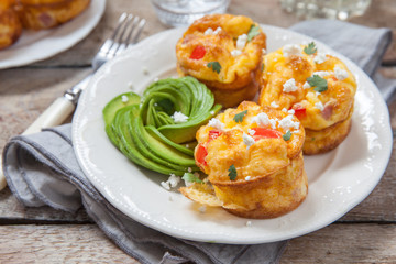 Delicious egg muffins with ham, cheese and vegetables