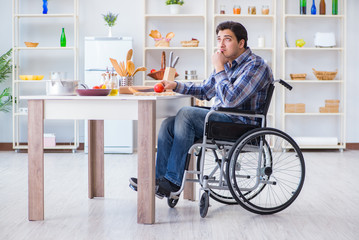 Young disabled husband preparing food salad