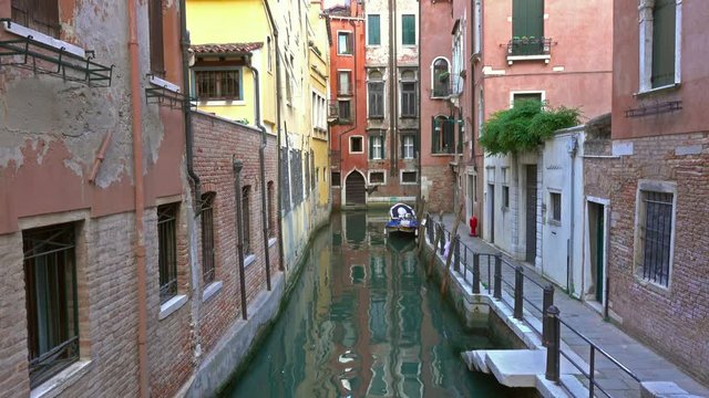 Old houses and narrow canal in Venice, Italy, 4k
