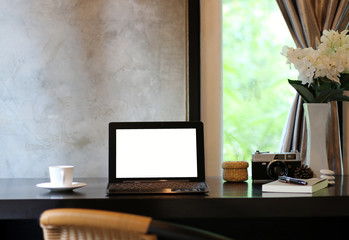 Workspace Laptop In the office at home style loft cement wall in background