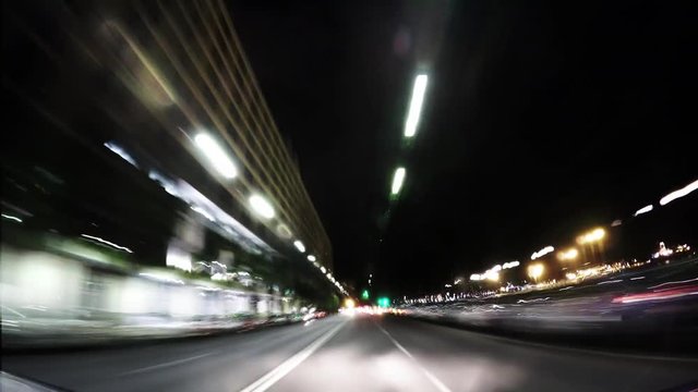city traffic at night , drunk driving concept , time lapse 