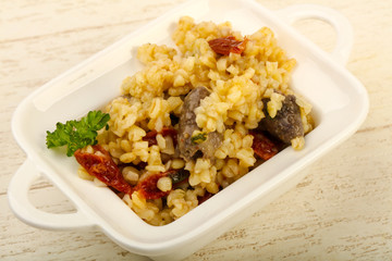 Bulgur with chicken hearts
