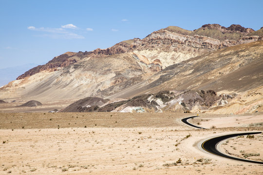A winding road running through Death Valley in California 