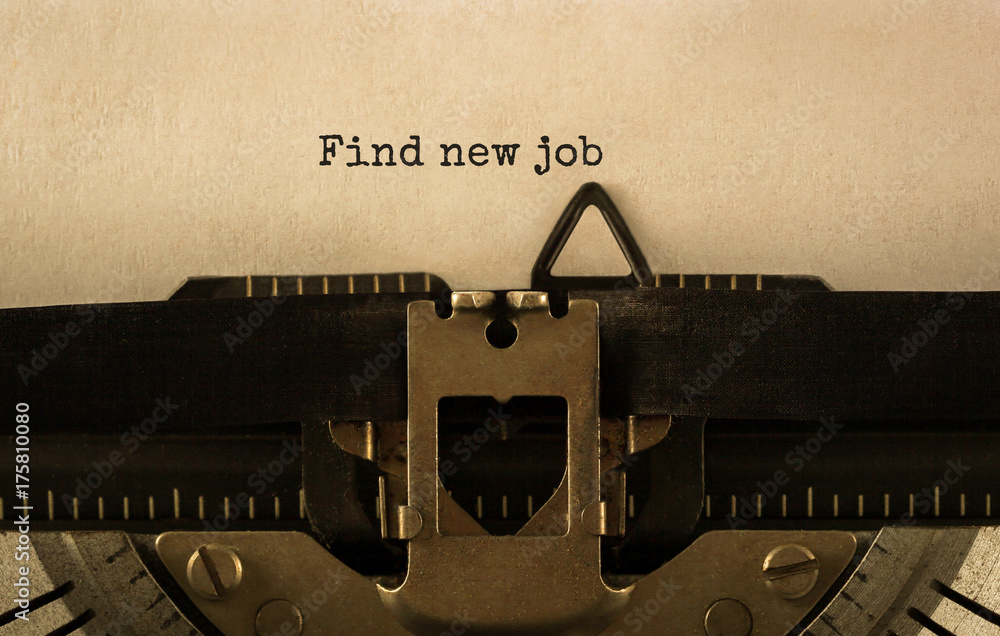 Poster text find new job typed on retro typewriter