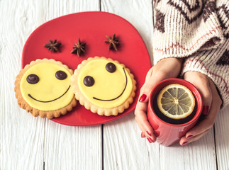 hot tea with lemon in hand