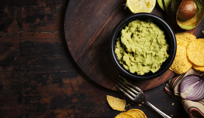 Mexican nachos chips with fresh guacamole sauce