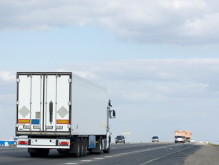 The truck on asphalt road