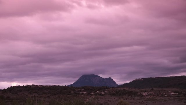 bugarach peak resembling Mount Sinai with moving clouds in Corbieres, France