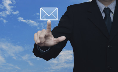 Businessman pressing mail flat icon over blue sky with white clouds, Contact us concept