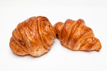 Buttercake with raisins and croissant