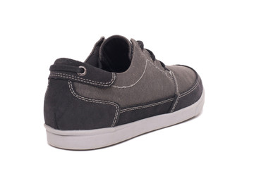 Stylish grey sneakers isolated on white background with clipping path.