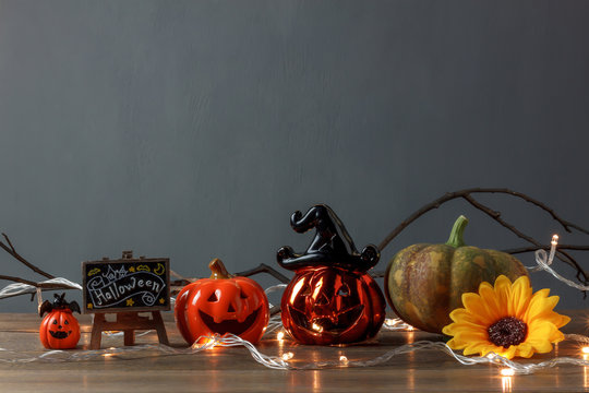 Accessory Of Happy Halloween Festival Concept.Essential Decorations On The Modern Brown Wooden Home Office Desk Background And Copy Space.pumpkins And Mix Several Sign Objects Prepare For The Season.