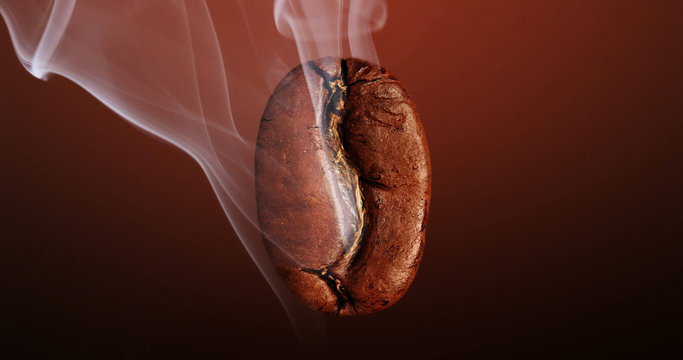 hot coffee bean smoked in a deep dark background