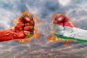 Two fist with the flag of China and Italy faced at each other ready for fight