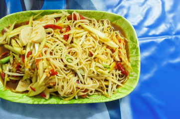 Papaya salad with vermicelli, salted crab and fermented fish in dishes. For Thai food.
