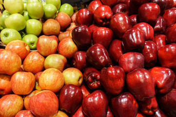 Stack of many colorful apple in the market. For food, fruit, kitchen, texture, background and vegetables.