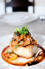 Grilled cod fish with vegetable and balsamic sauce