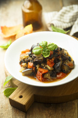Vegetable stew with fresh green basil