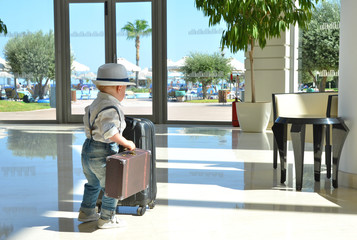 Young traveler with a suitcase