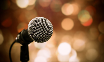 Microphones on bokeh background in seminar room prepare for talking speech in conference hall