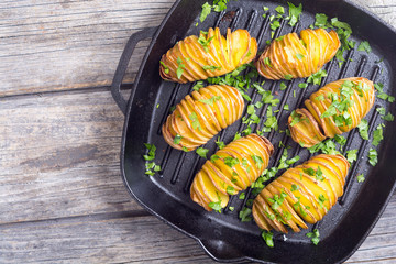 Freshly baked hasselback potatoes