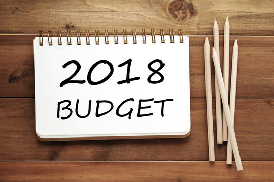 2018 budget word on notebook paper on wood background, financial concept, business strategy