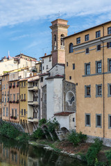 Old houses along the banks of the Arno River in Florence